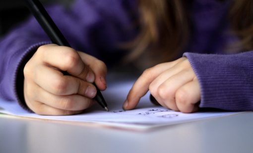 A-kid-drawing-or-writing